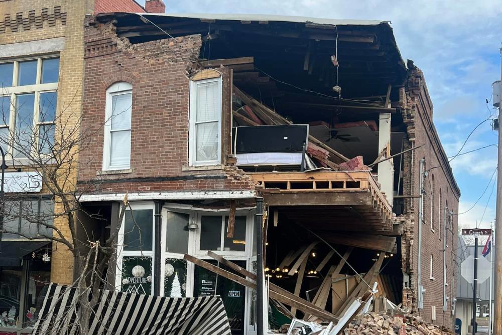 Emergency crews responded early yesterday to the building collapse.
